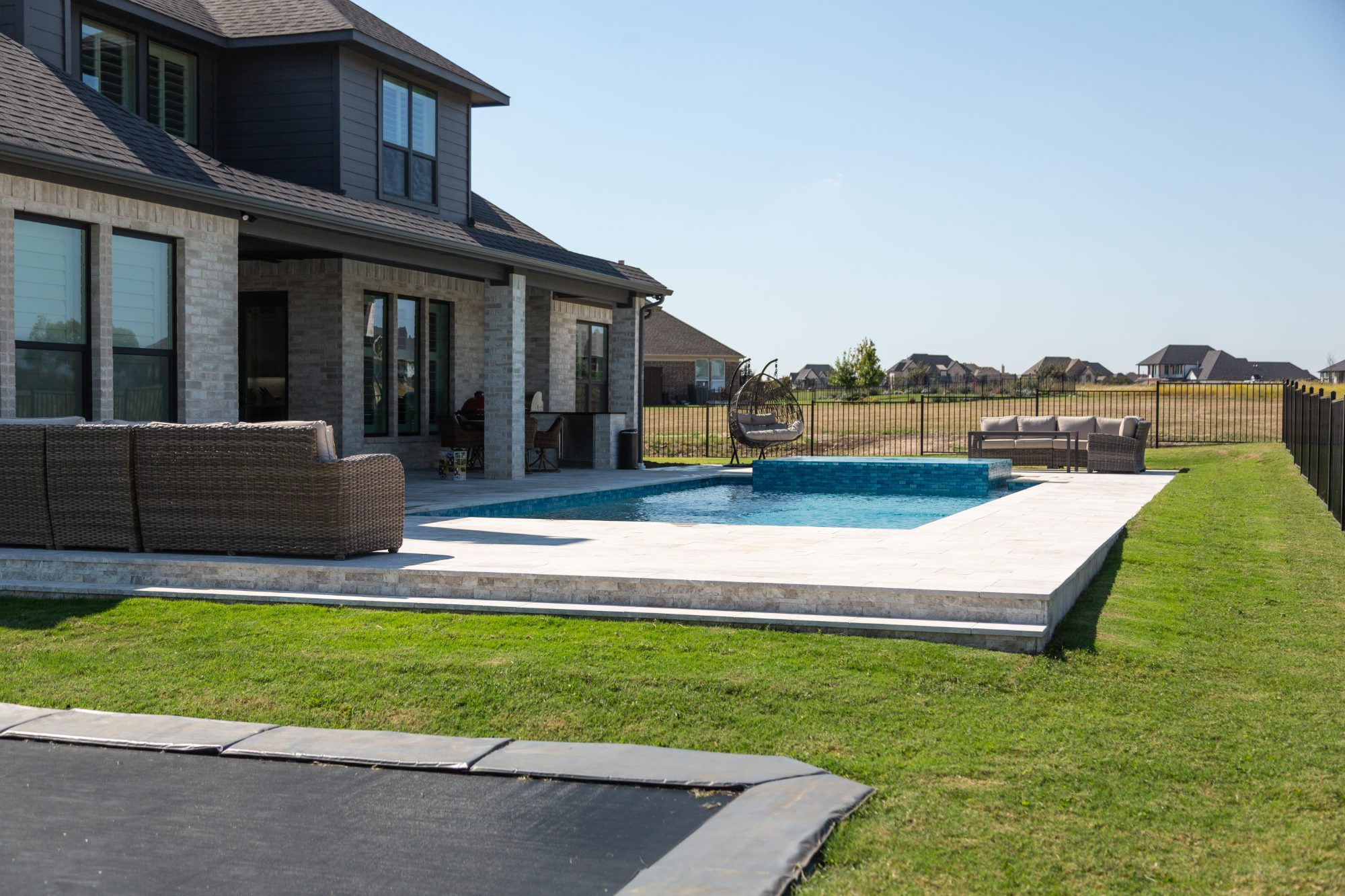 Geometric Pool with Raised Spa & Outdoor Kitchen — Celina, TX — photo 7
