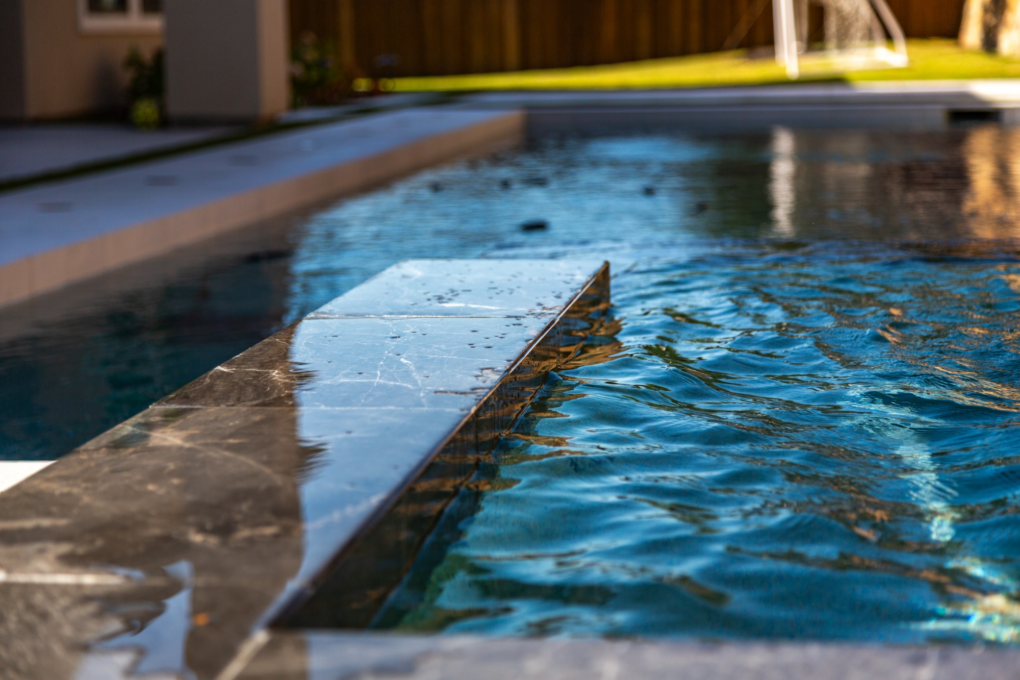 Modern Dark Marble Pool with Spa, Pergola & Outdoor Kitchen — Prosper, TX — photo 19