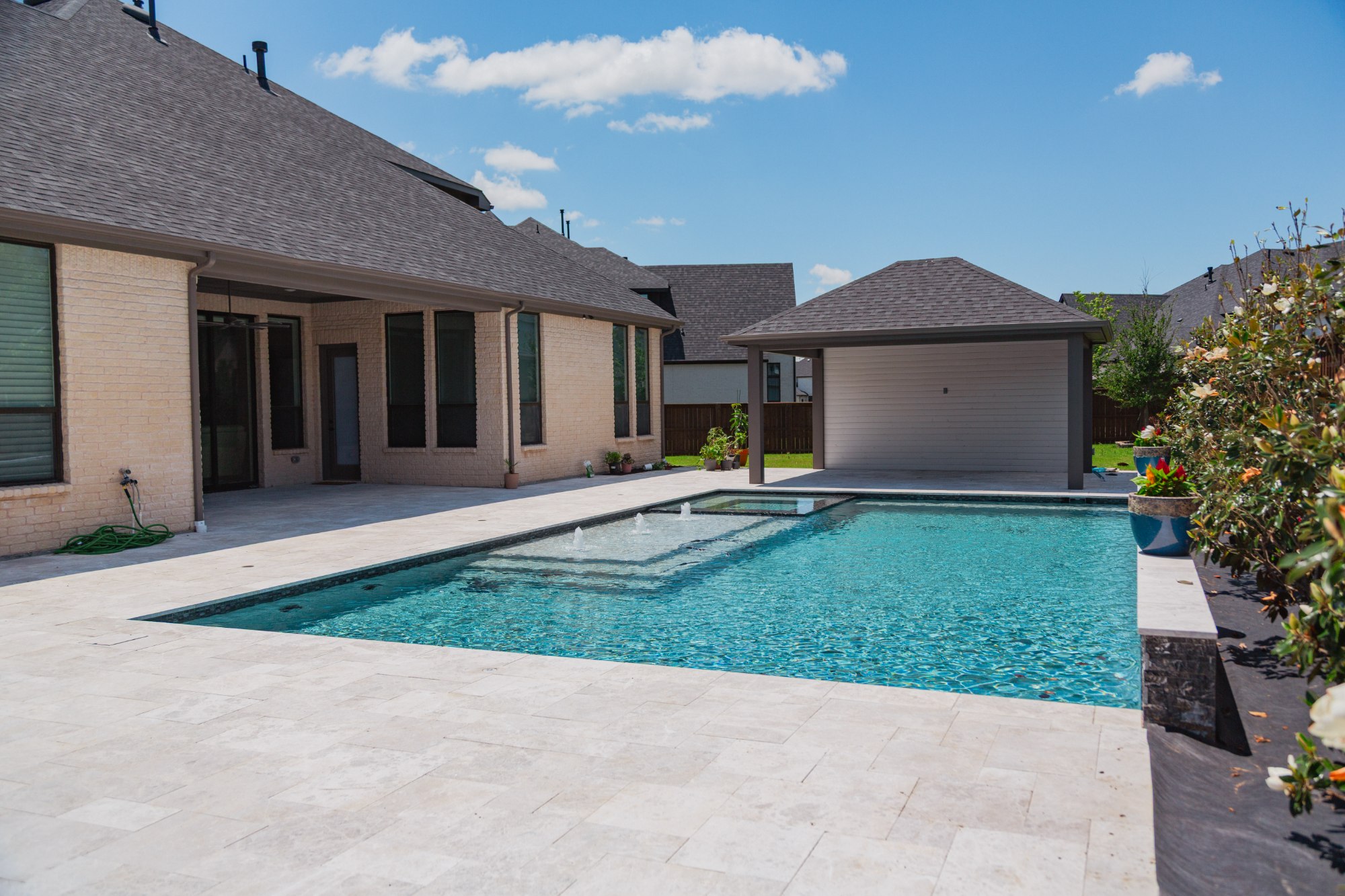 Geometric Pool with Pergola, Putting Green & Outdoor Kitchen — Frisco, TX — photo 11