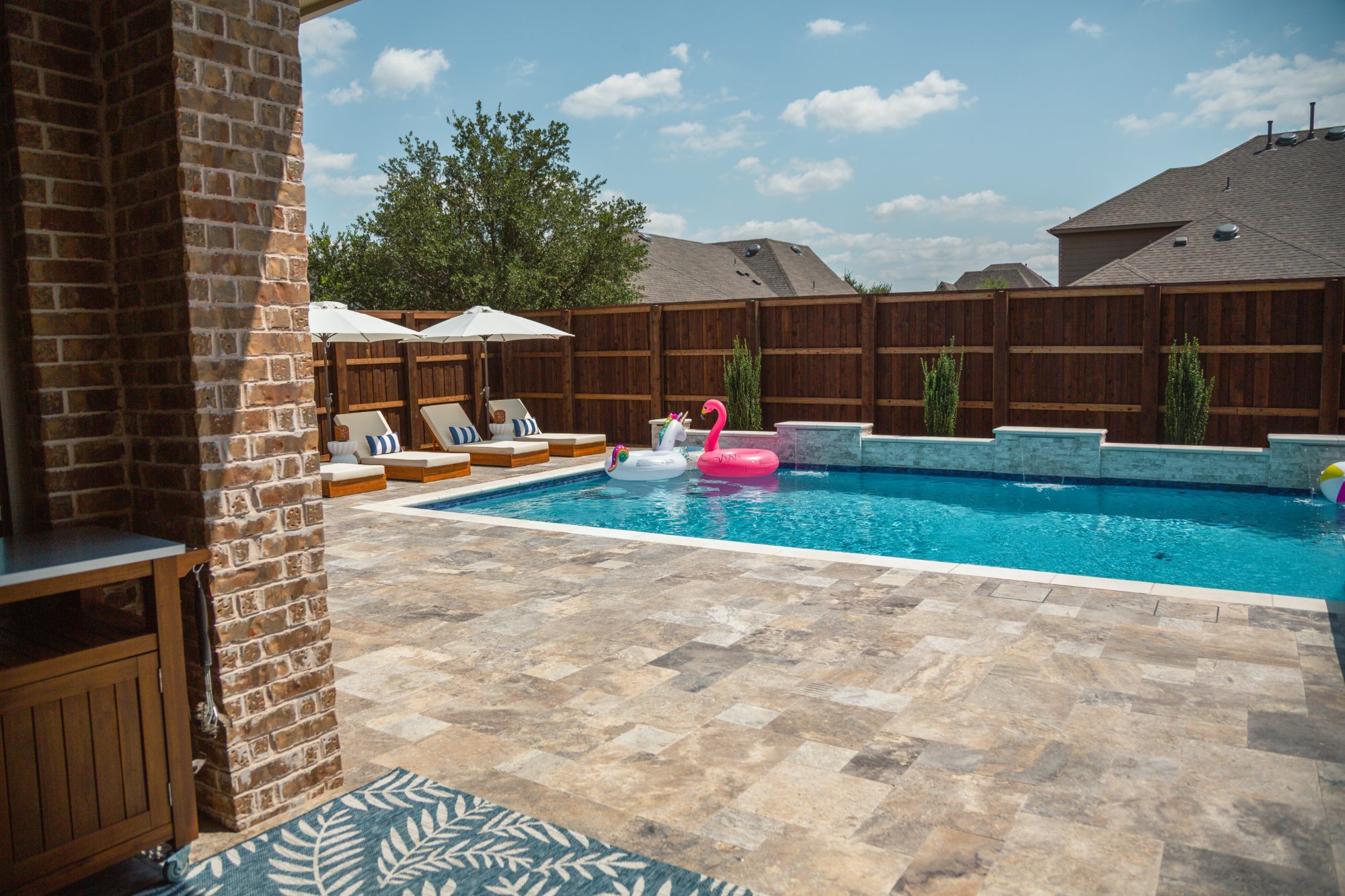 Modern Pool with Luxury Loungers & Outdoor Living — Prosper, TX — photo 14
