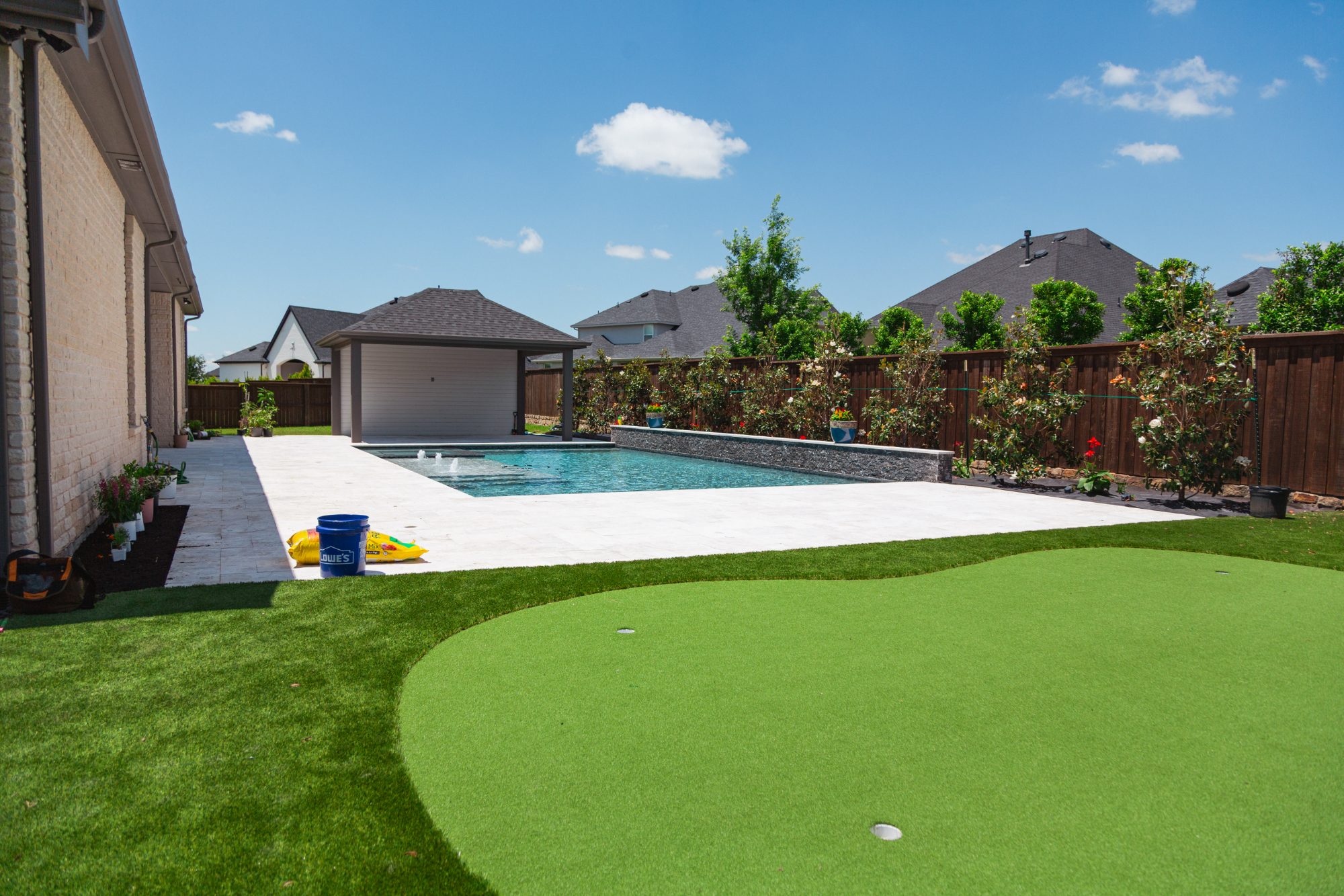 Geometric Pool with Pergola, Putting Green & Outdoor Kitchen — Frisco, TX — photo 10