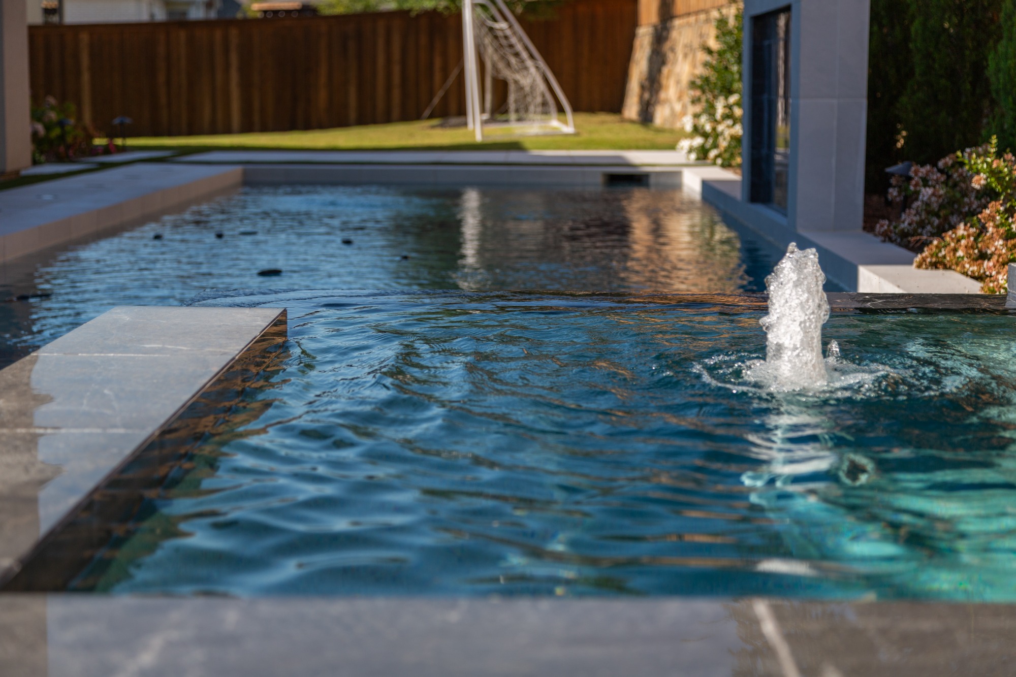 Modern Dark Marble Pool with Spa, Pergola & Outdoor Kitchen — Prosper, TX — photo 18