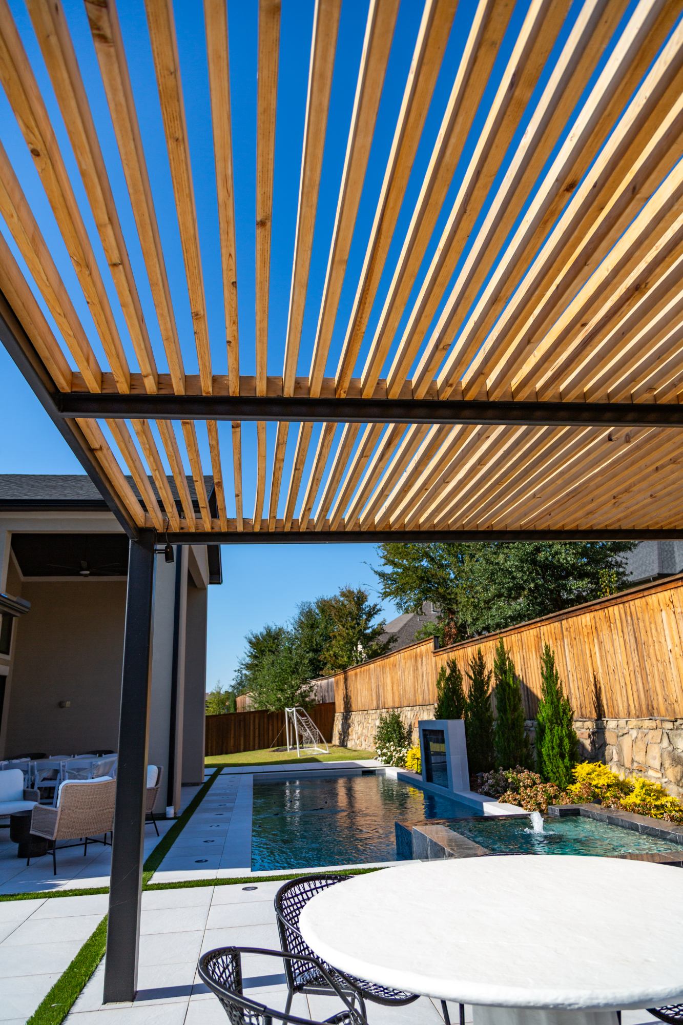 Modern Dark Marble Pool with Spa, Pergola & Outdoor Kitchen — Prosper, TX — photo 11